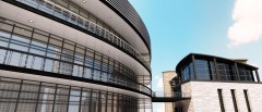 CG image render of 3D modeled modern round building exterior
